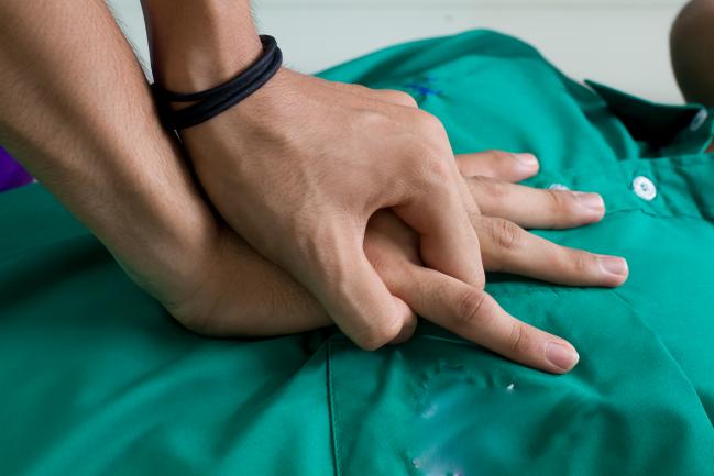 an unconscious person undergoing a CPR